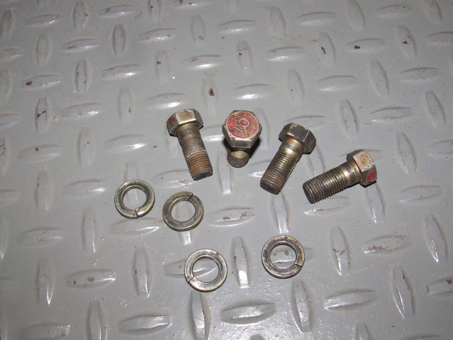 93 94 Mitsubishi Eclipse OEM Front Brake Caliper Mounting Bolt Set