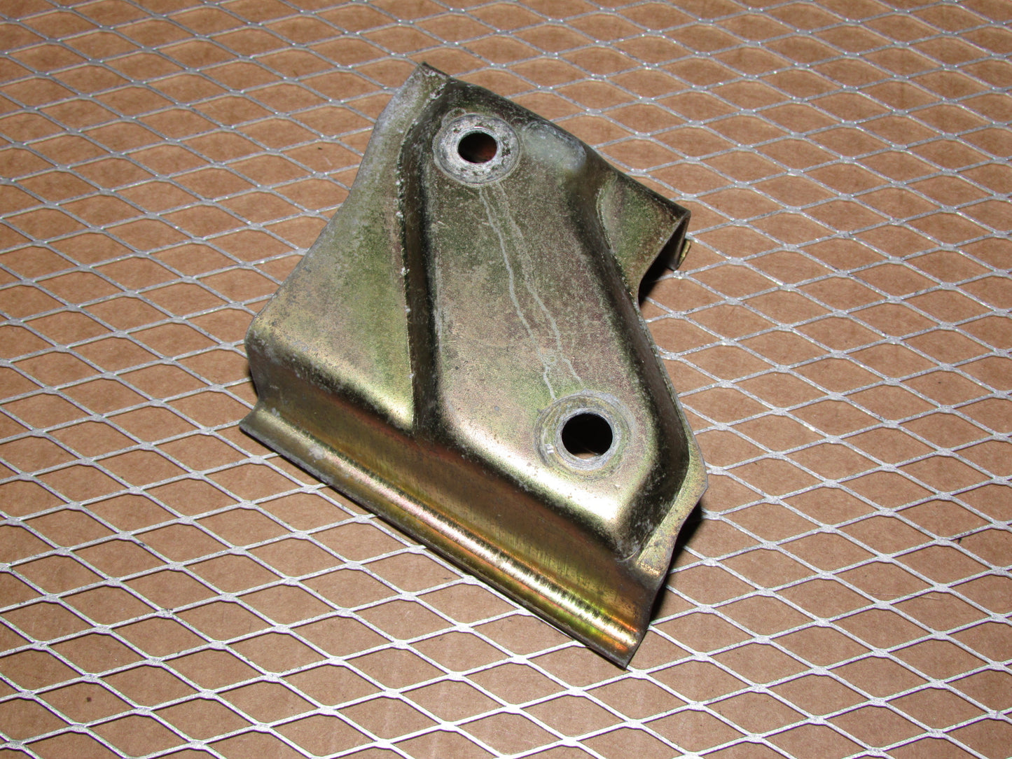79 80 Datsun 280zx OEM Exterior Door Handle Mounting Bracket - Left