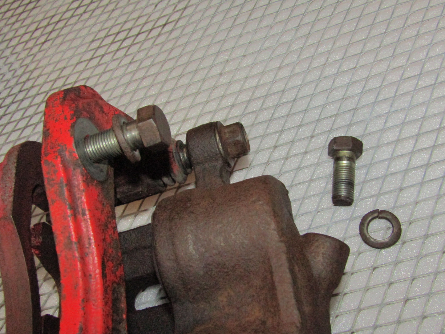 94 95 96 Mitsubishi 3000GT Non Turbo OEM Front Brake Caliper Mounting Bolt - Left
