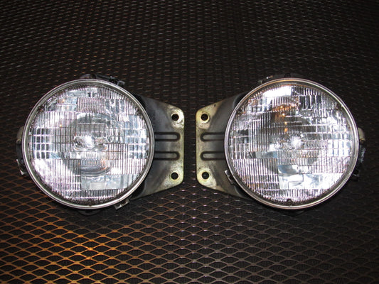 81 82 83 Datsun 280zx OEM Headlight & Bracket - Set