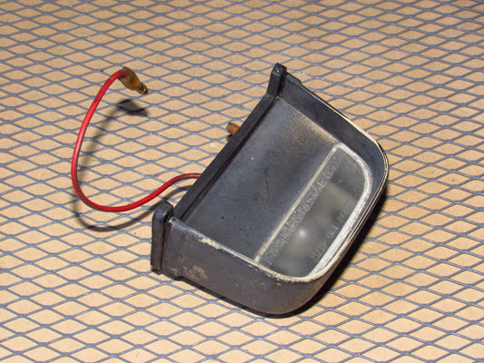 79-80 Mazda RX7 OEM Rear License Plate Light Lamp
