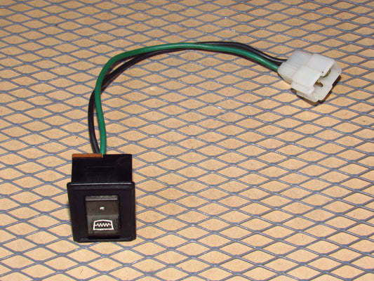 79-80 Mazda RX7 OEM Rear Defroster Switch