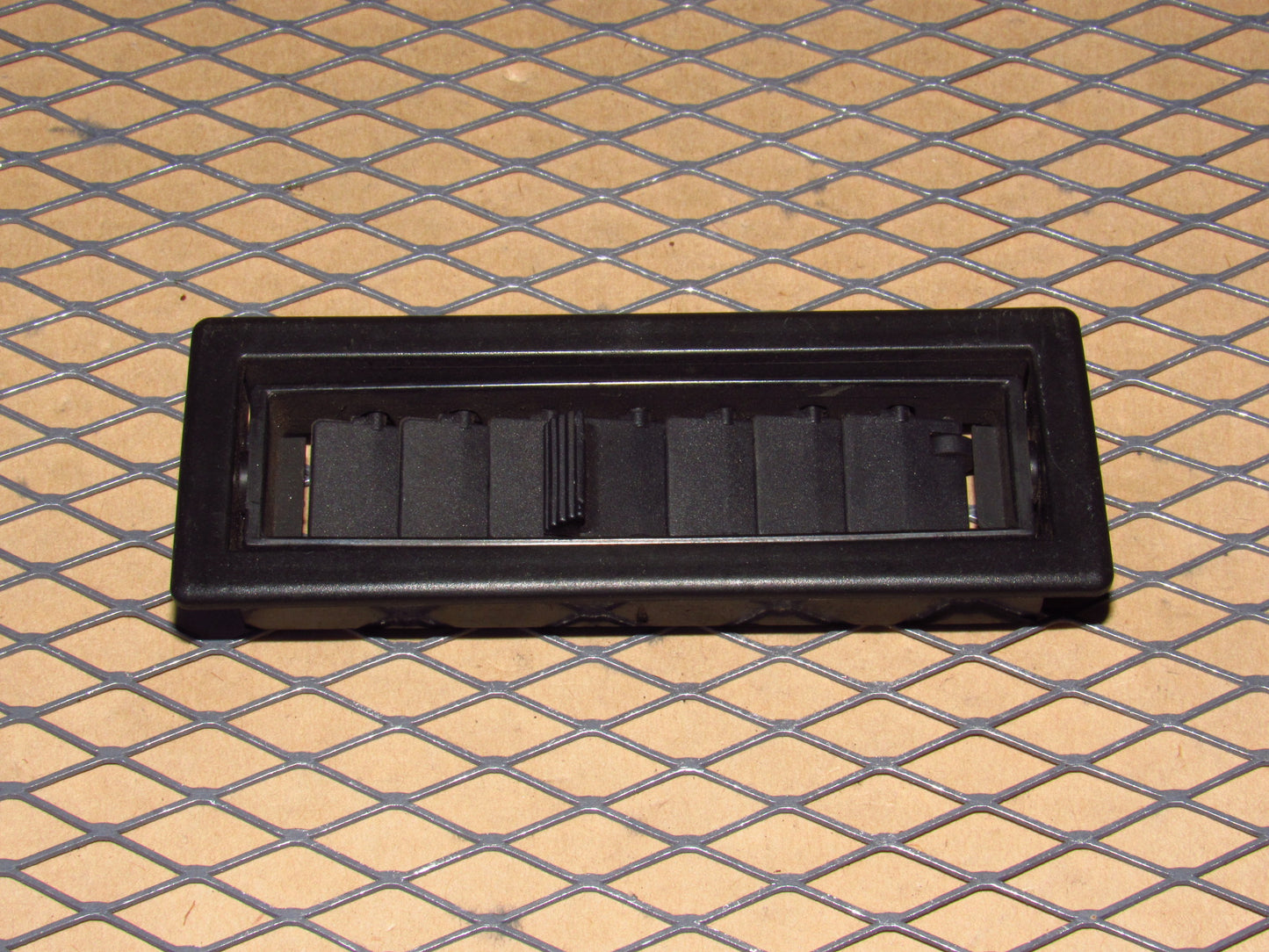 84-85 Mazda RX7 OEM Under Dash Lower Leg Air Vent Louver - Left