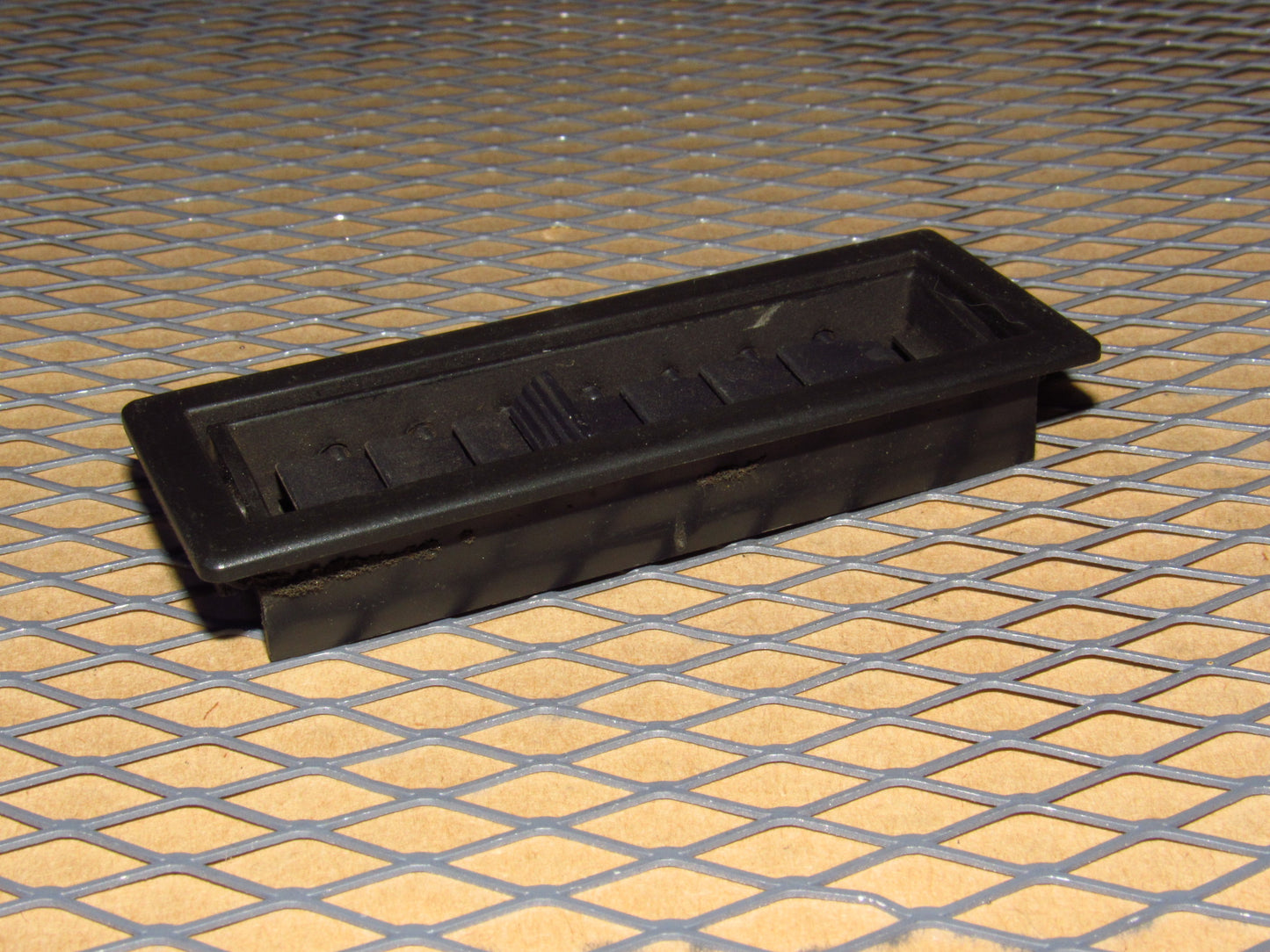 84-85 Mazda RX7 OEM Under Dash Lower Leg Air Vent Louver - Left
