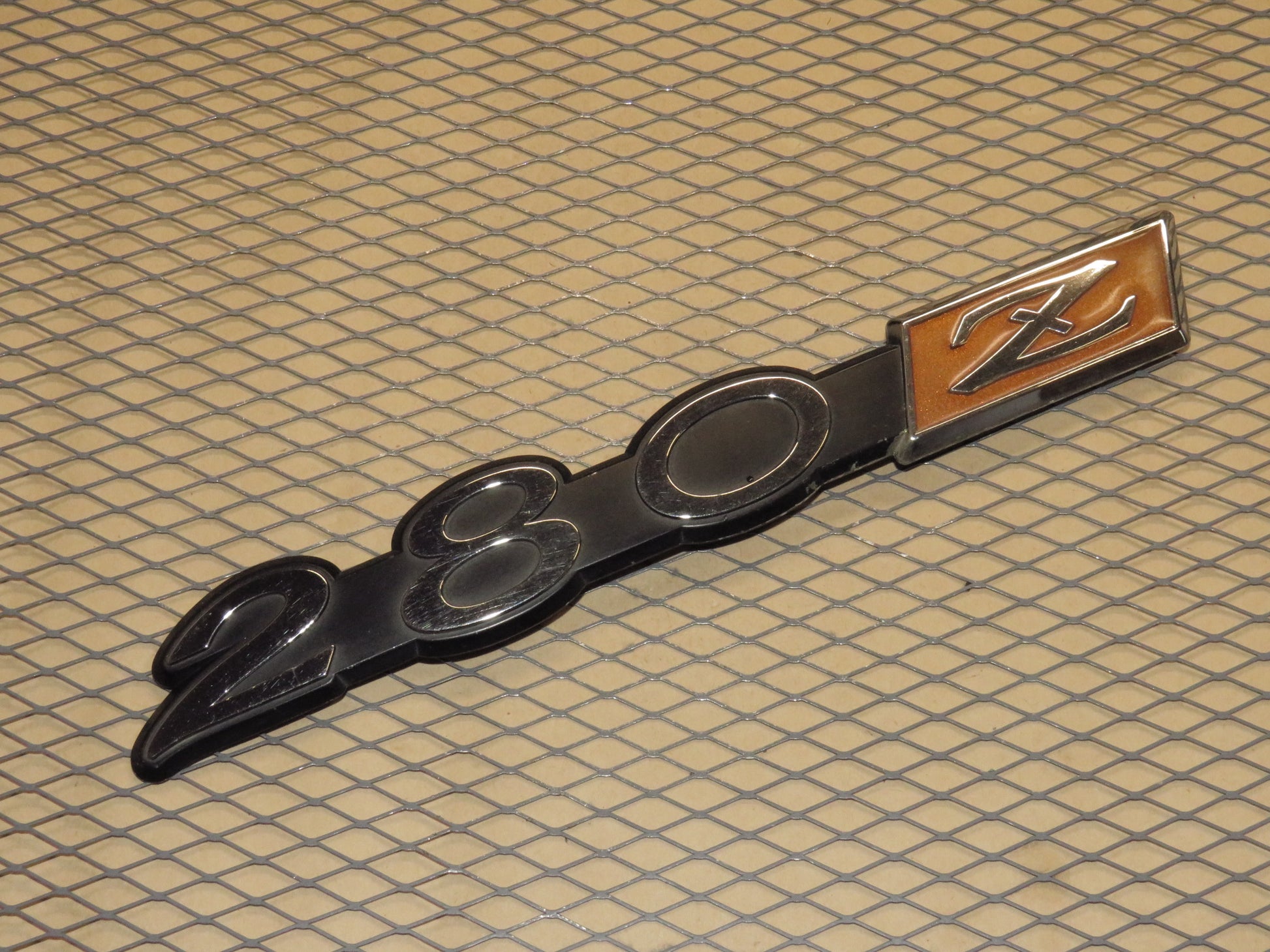 75 76 77 78 Datsun 280z OEM Fender Emblem Badge