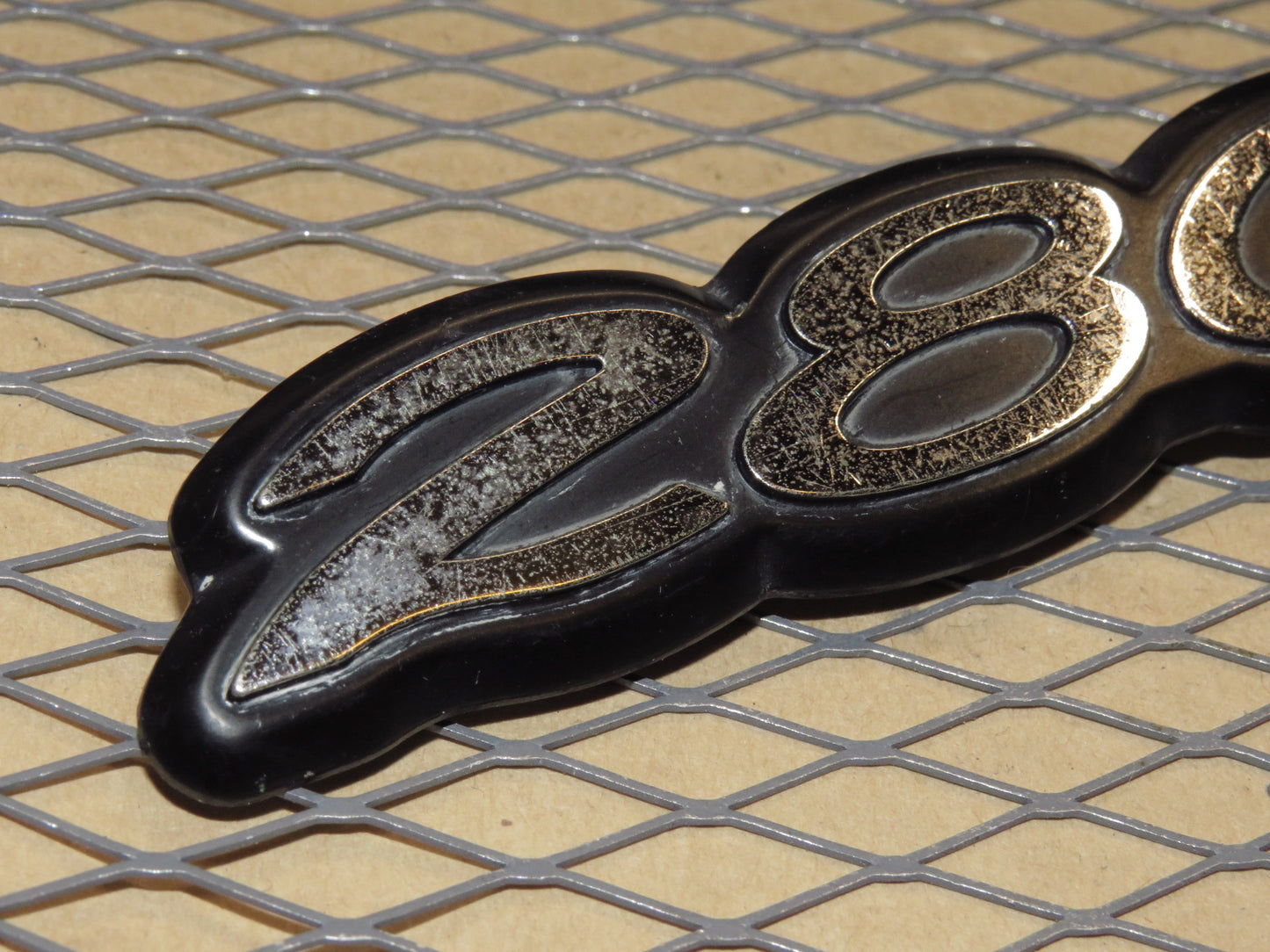 75 76 77 78 Datsun 280z OEM Trunk Emblem Badge