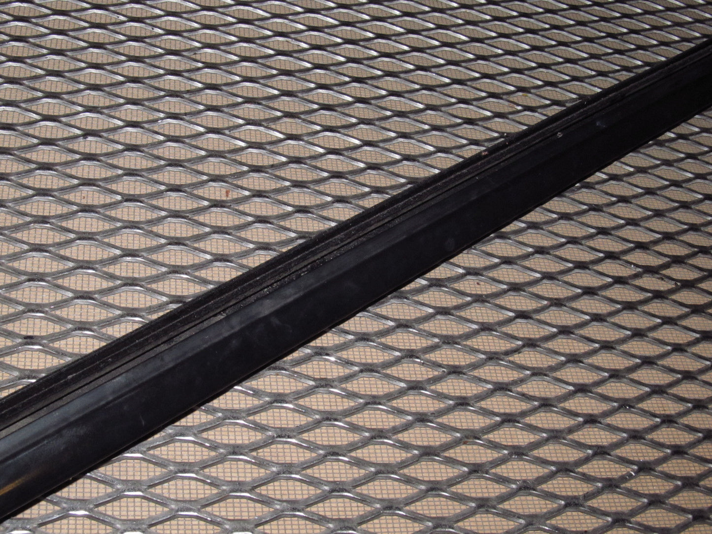 97 98 99 Mitsubishi Eclipse OEM Door Panel Window Guide Moulding - Left