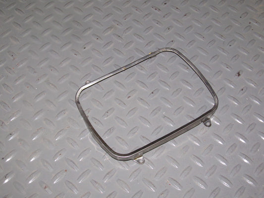 86 87 88 Mazda RX7 OEM Headlight Holder Chrome Bezel