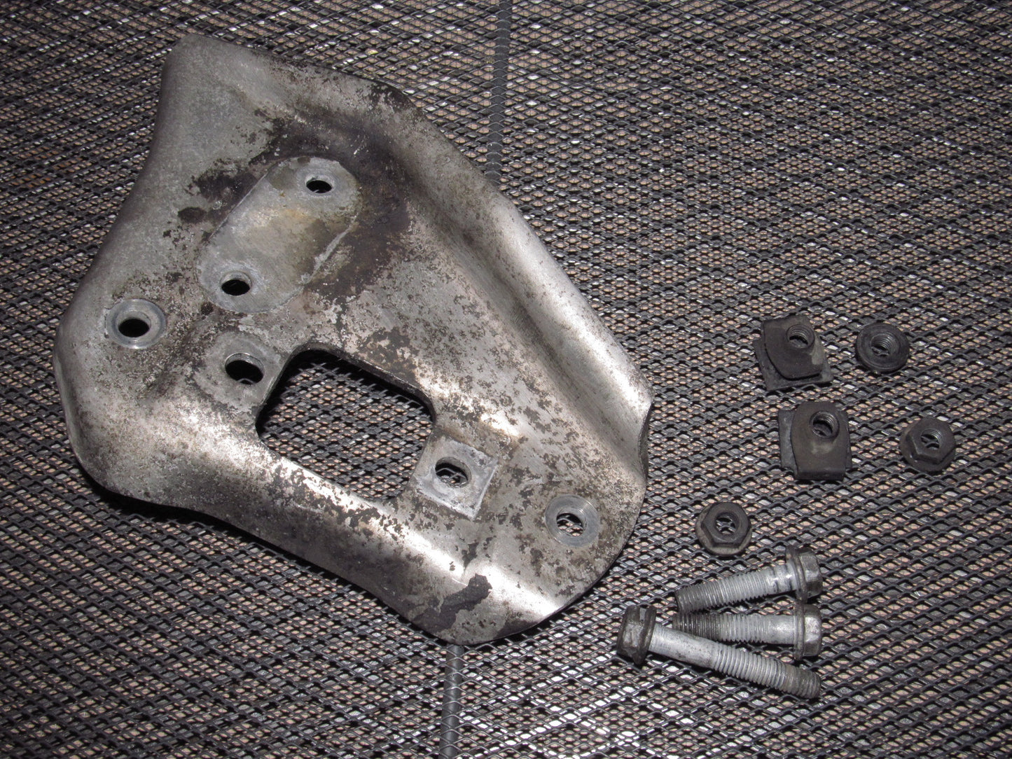 84-87 Chevrolet Corvette OEM Front Lower Control Arm Upper Cover Bracket - Left