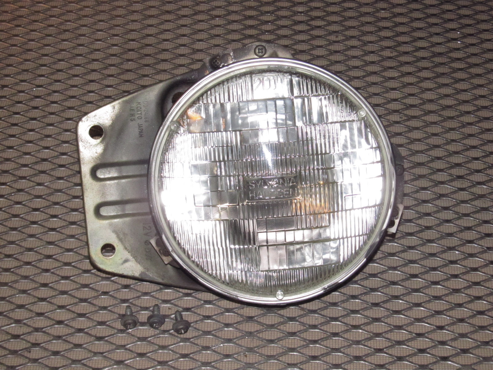 79 80 Datsun 280zx OEM Headlight & Bracket - Left