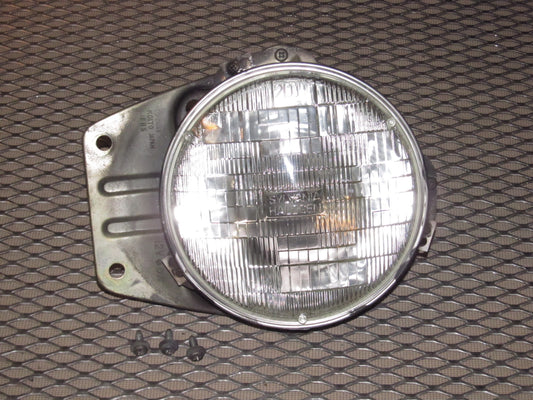 79 80 Datsun 280zx OEM Headlight & Bracket - Left