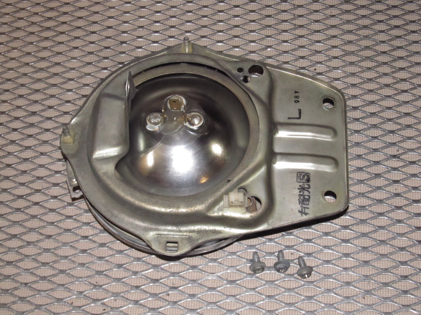 79 80 Datsun 280zx OEM Headlight & Bracket - Left