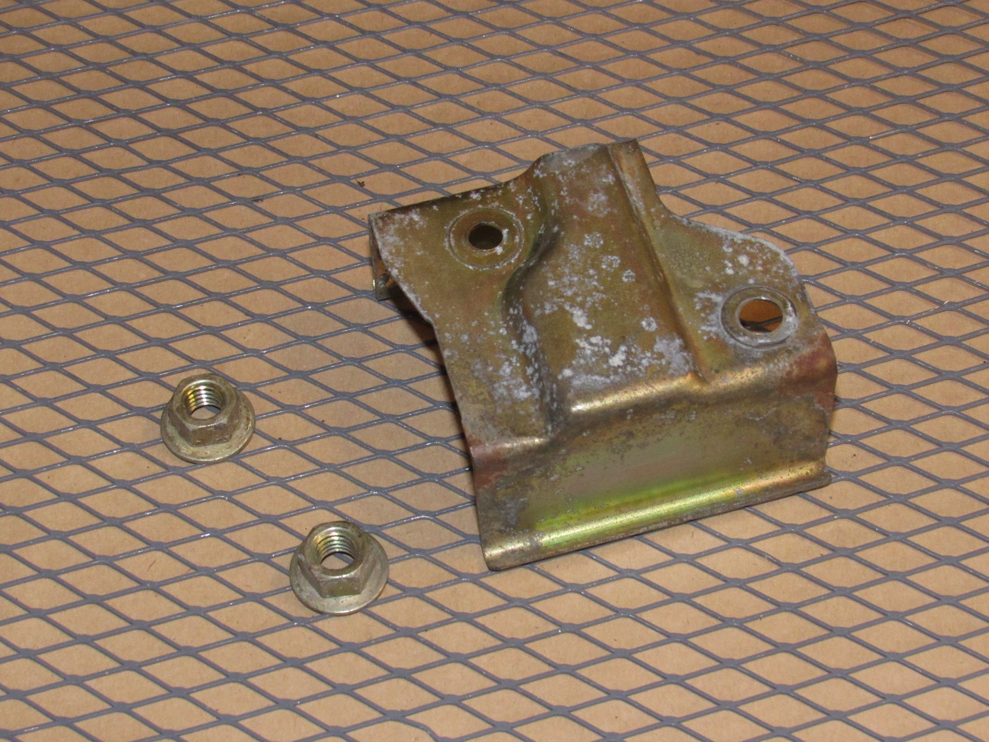 82 83 Datsun 280zx OEM Exterior Door Handle Rear Mounting Bracket - Left