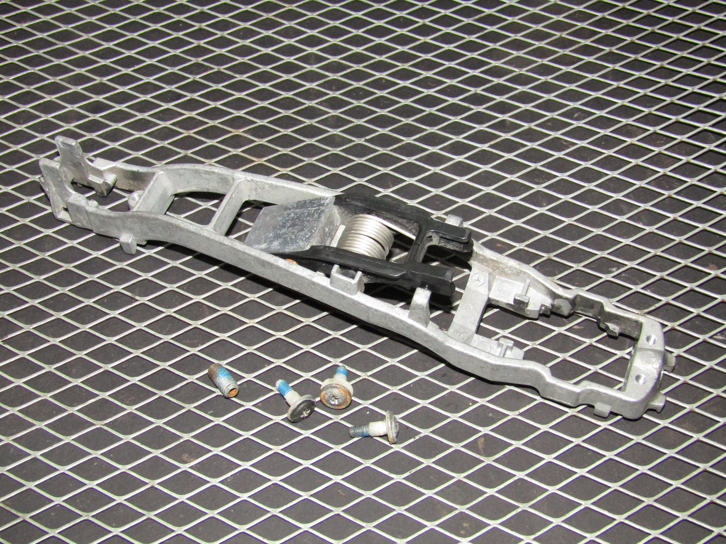 86-93 Mercedes Benz 300E OEM Front Exterior Door Handle Rear Mounting Bracket - Left