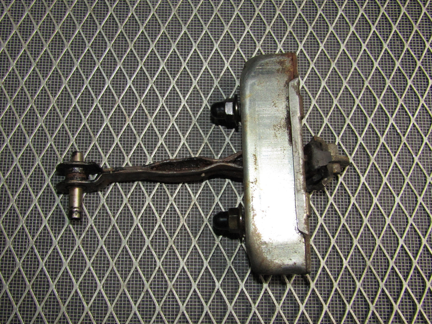 87-91 Toyota Crown Royal Saloon OEM Door Check Stopper - Front Left