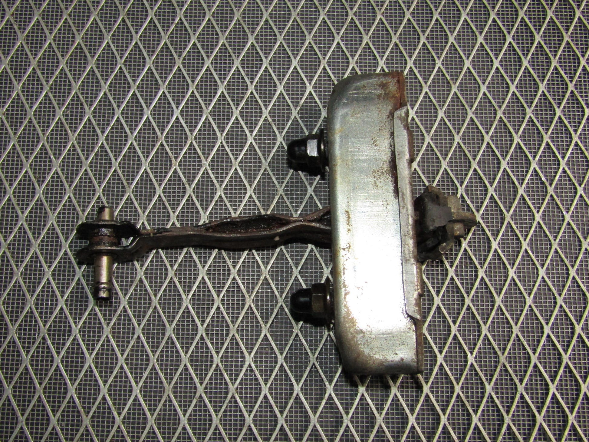 87-91 Toyota Crown Royal Saloon OEM Door Check Stopper - Front Left