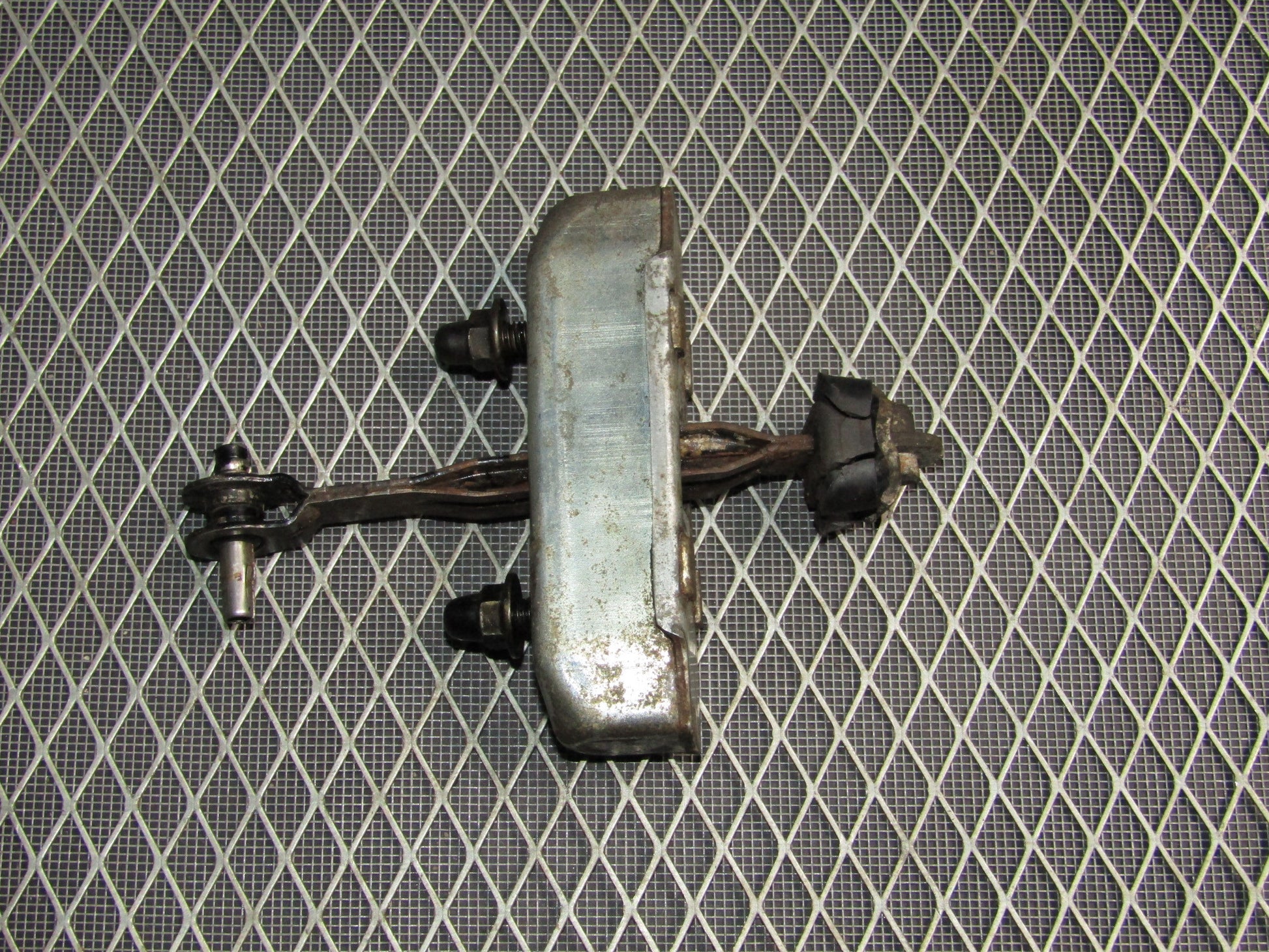 87-91 Toyota Crown Royal Saloon OEM Door Check Stopper - Front Right