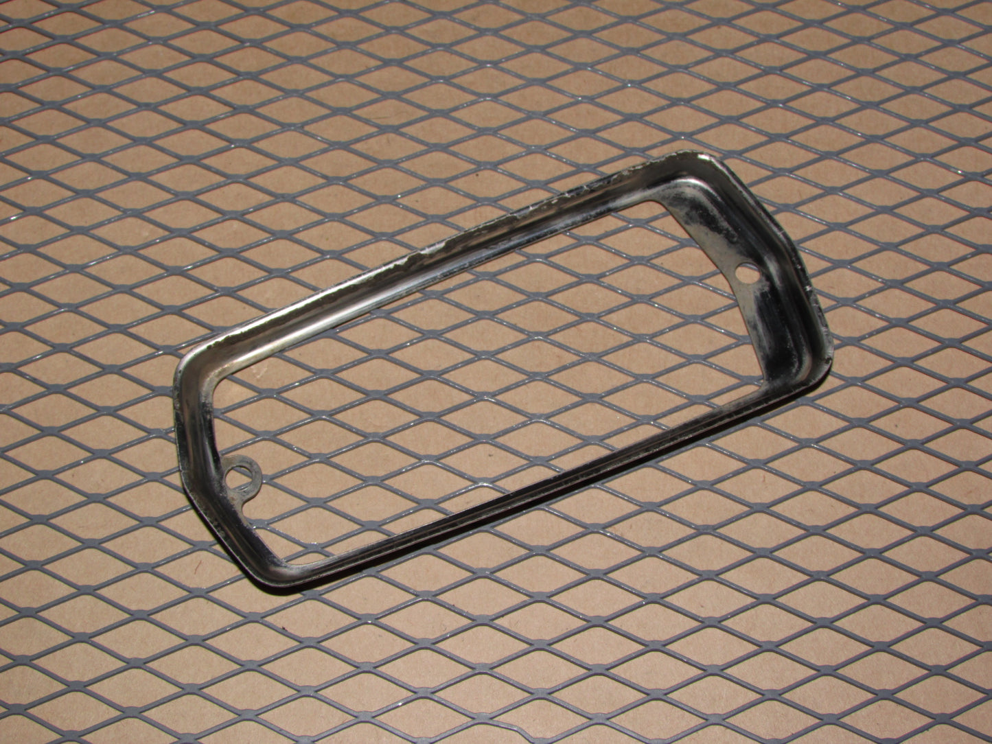 75 76 77 78 Datsun 280z OEM Rear Side Marker Chrome Bezel - Left
