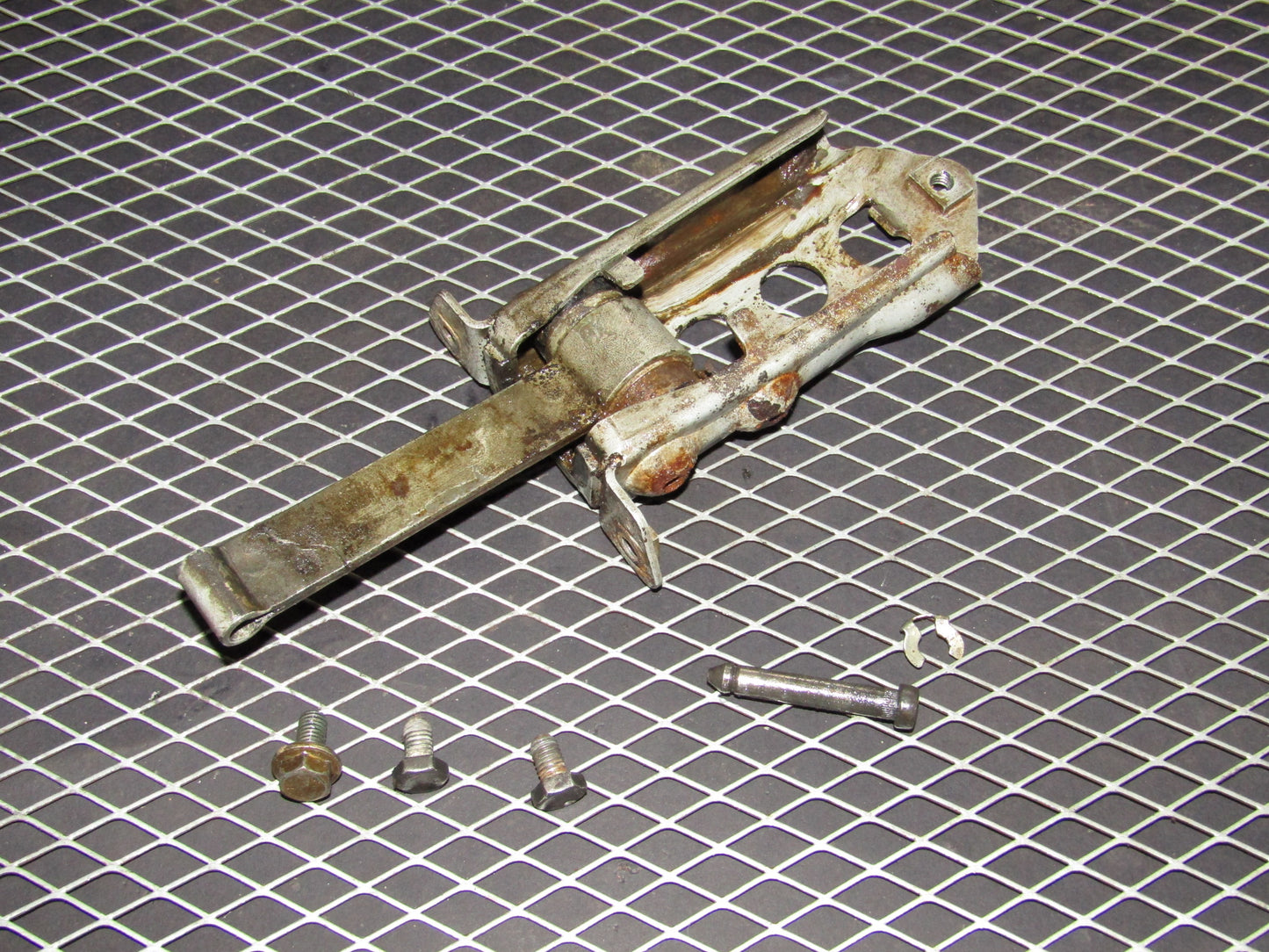 86-93 Mercedes Benz 300E OEM Rear Exterior Door Check Stopper - Left