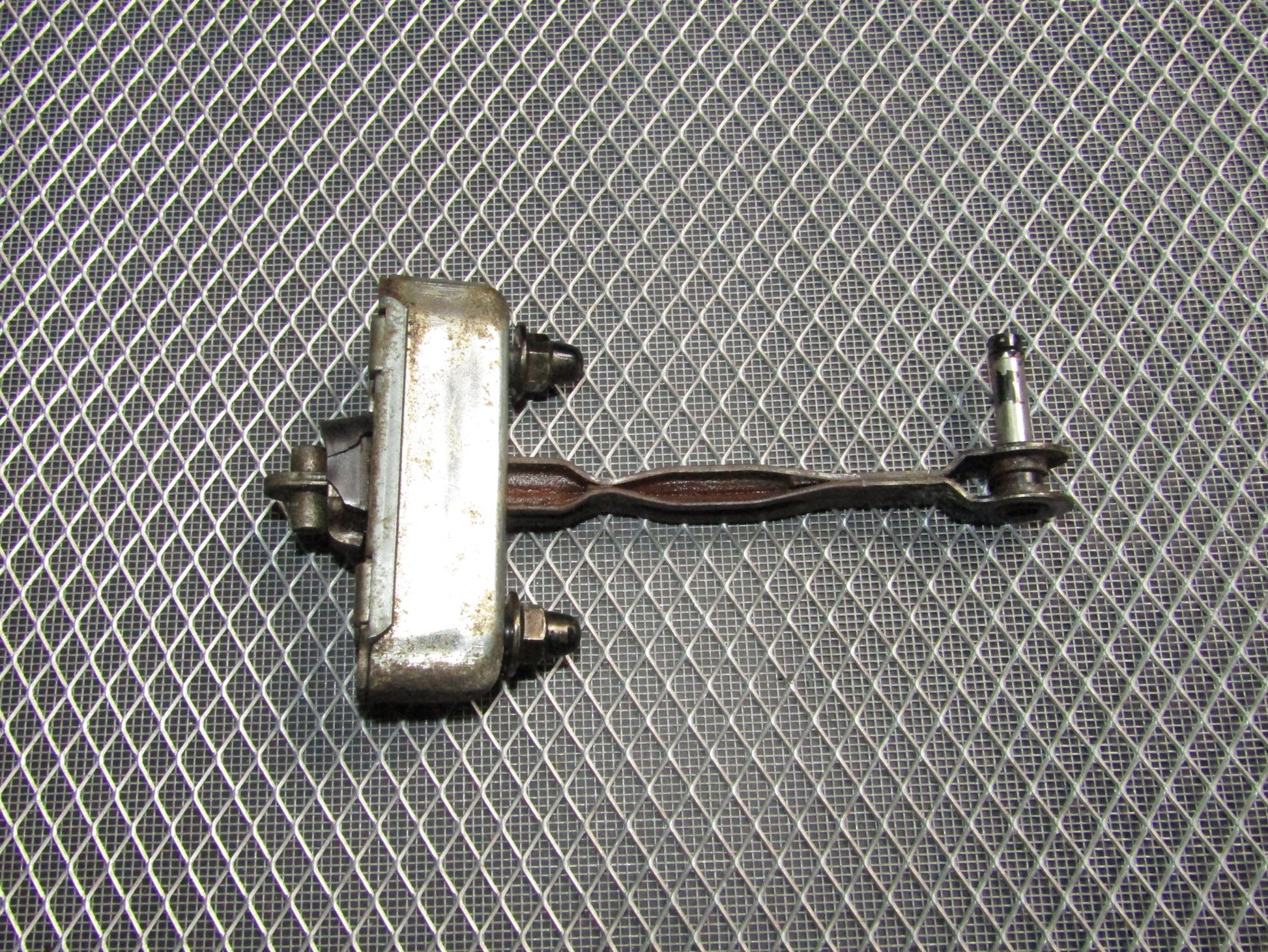 87-91 Toyota Crown Royal Saloon OEM Door Check Stopper - Rear Left