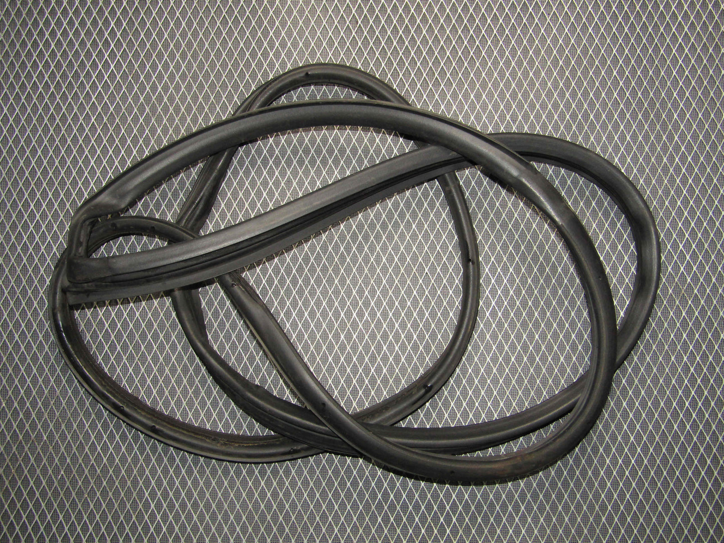 87-91 Toyota Crown Royal Saloon OEM Door Weather Stripping - Rear Left