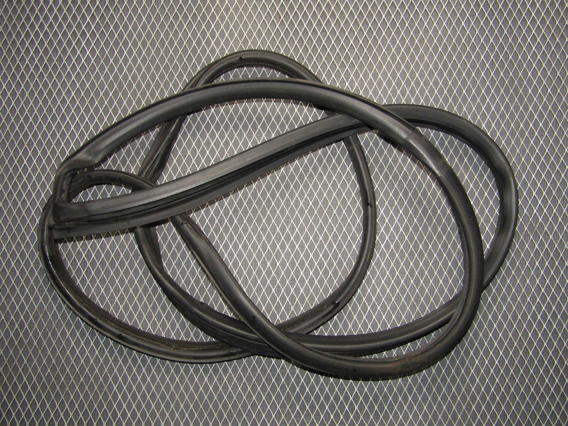 87-91 Toyota Crown Royal Saloon OEM Door Weather Stripping - Rear Left