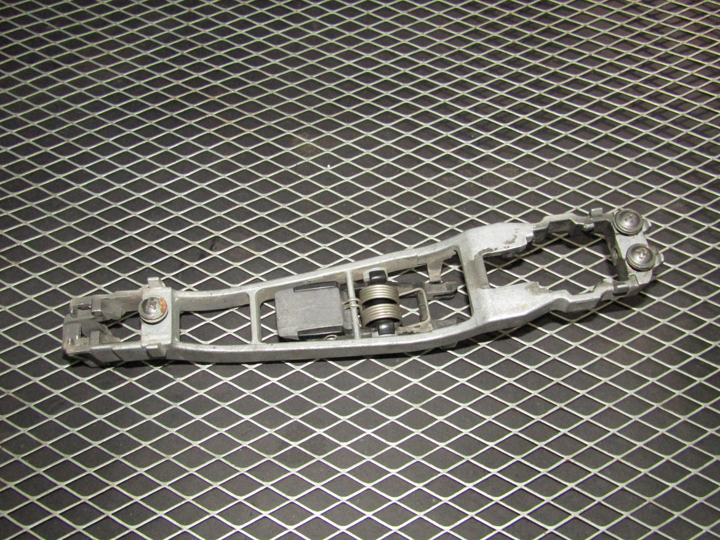 86-93 Mercedes Benz 300E OEM Front Exterior Door Handle Mounting Bracket - Right