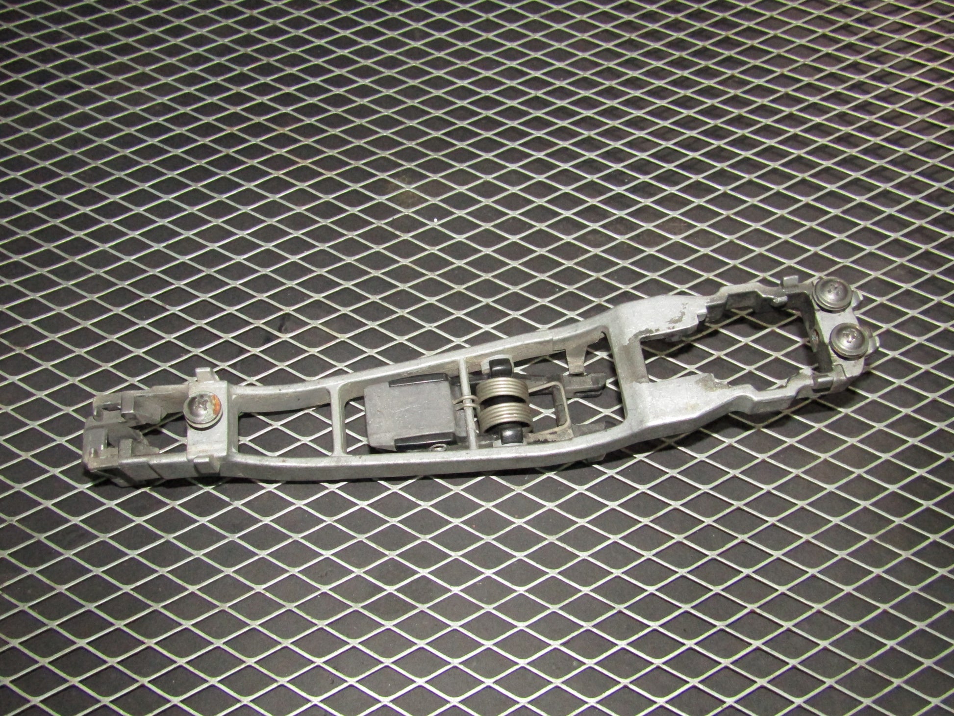 86-93 Mercedes Benz 300E OEM Front Exterior Door Handle Mounting Bracket - Right