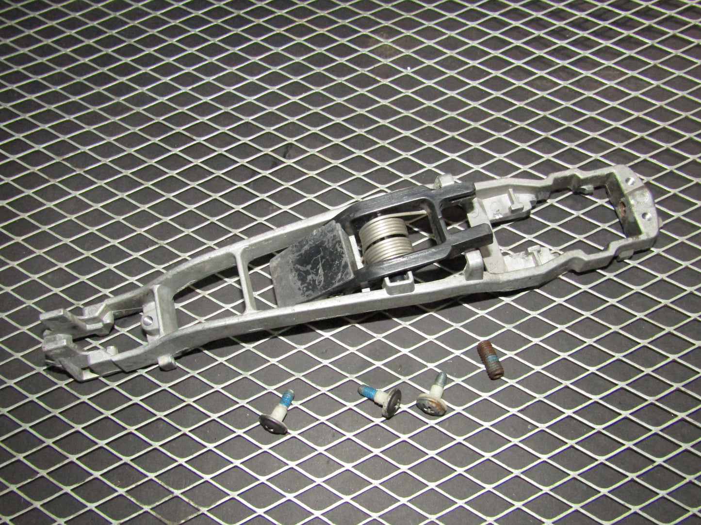 86-93 Mercedes Benz 300E OEM Front Exterior Door Handle Mounting Bracket - Right