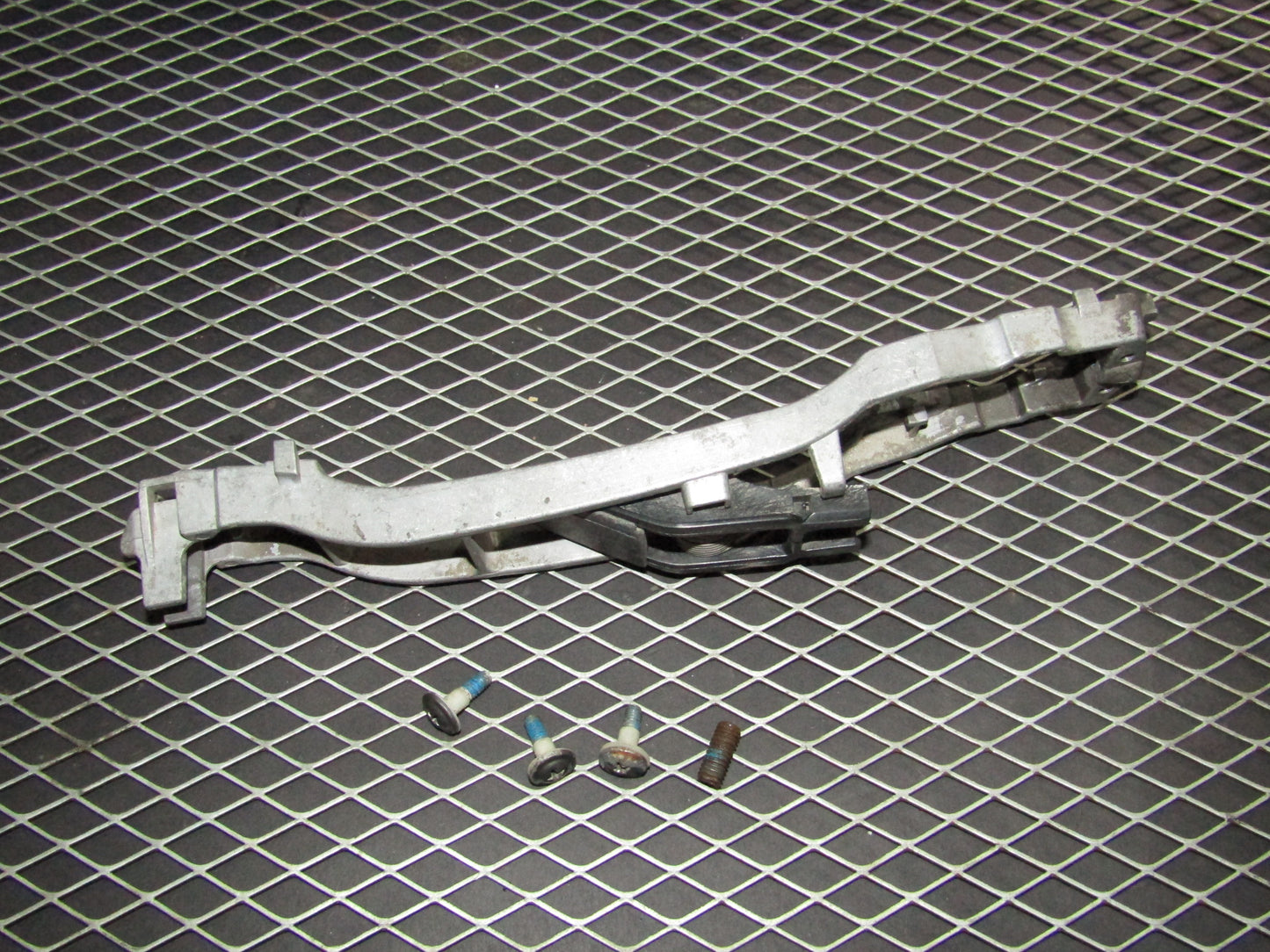 86-93 Mercedes Benz 300E OEM Front Exterior Door Handle Mounting Bracket - Right