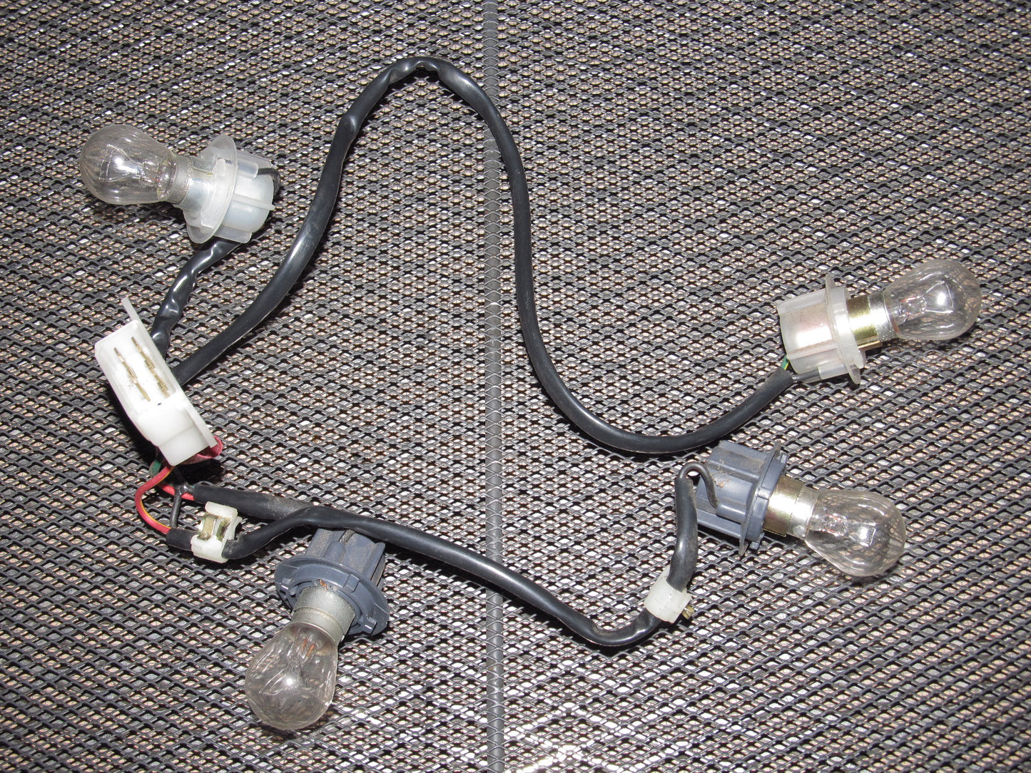 81-83 Mazda RX7 OEM Tail Light Bulb Socket - Left
