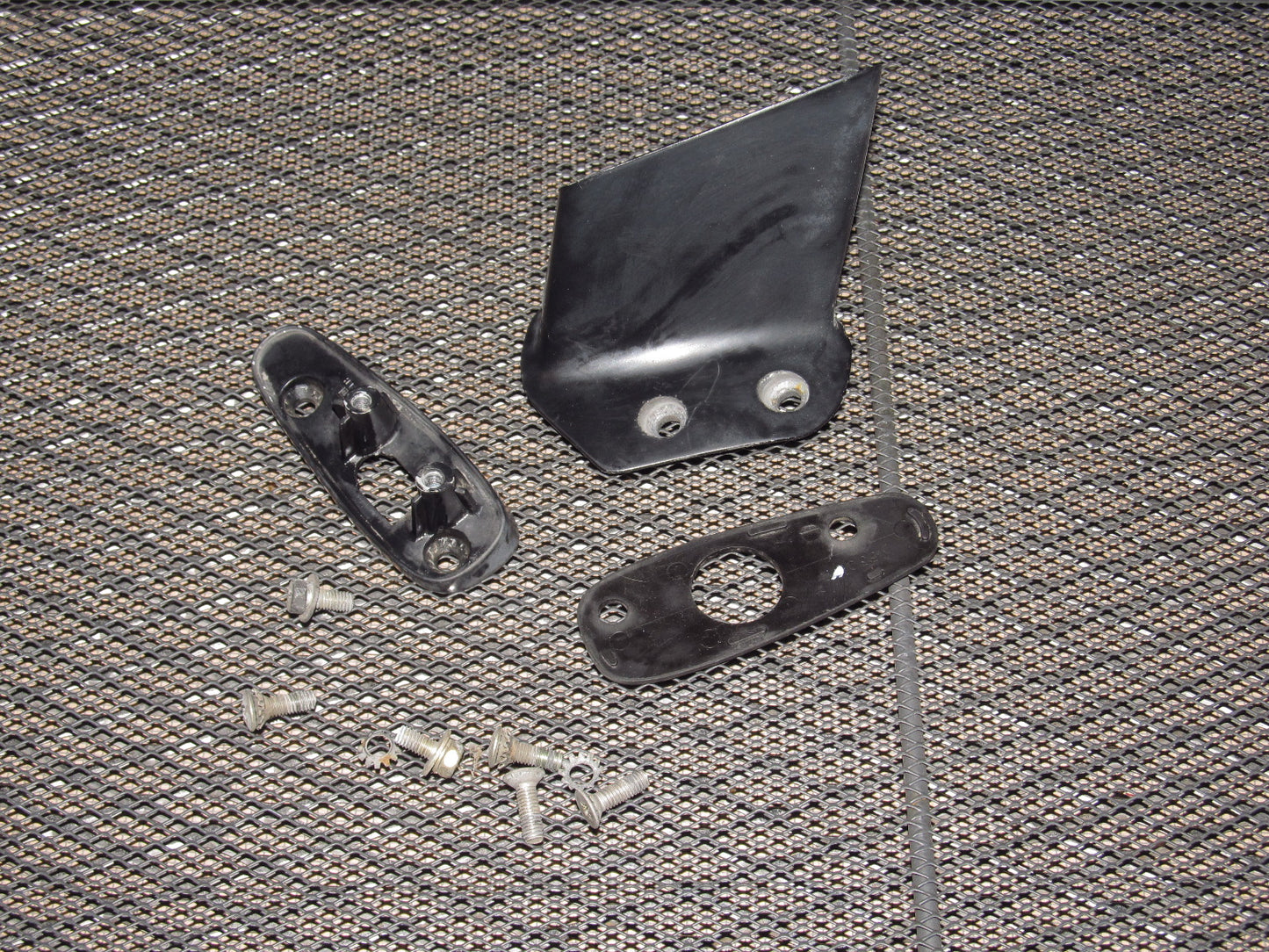81-85 Mazda RX7 OEM Exterior Side Mirror Bracket - Left