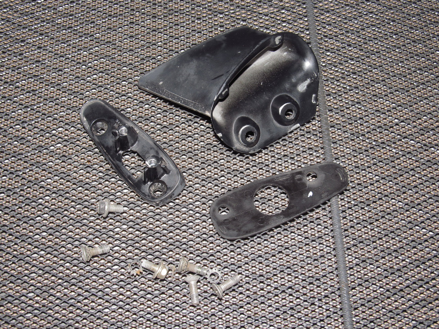 81-83 Mazda RX7 OEM Exterior Side Mirror Bracket - Left