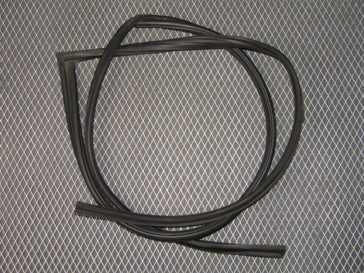 87-91 Toyota Crown Royal Saloon OEM Door Window Weather Stripping - Front Left