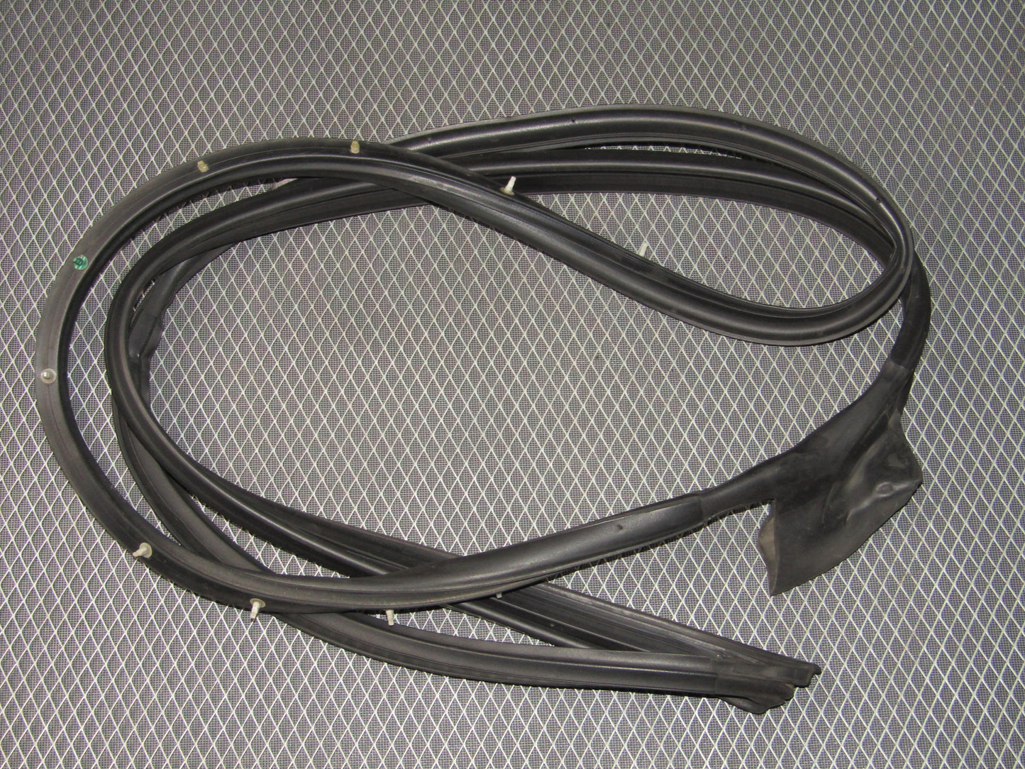 87-91 Toyota Crown Royal Saloon OEM Door Weather Stripping - Front Left