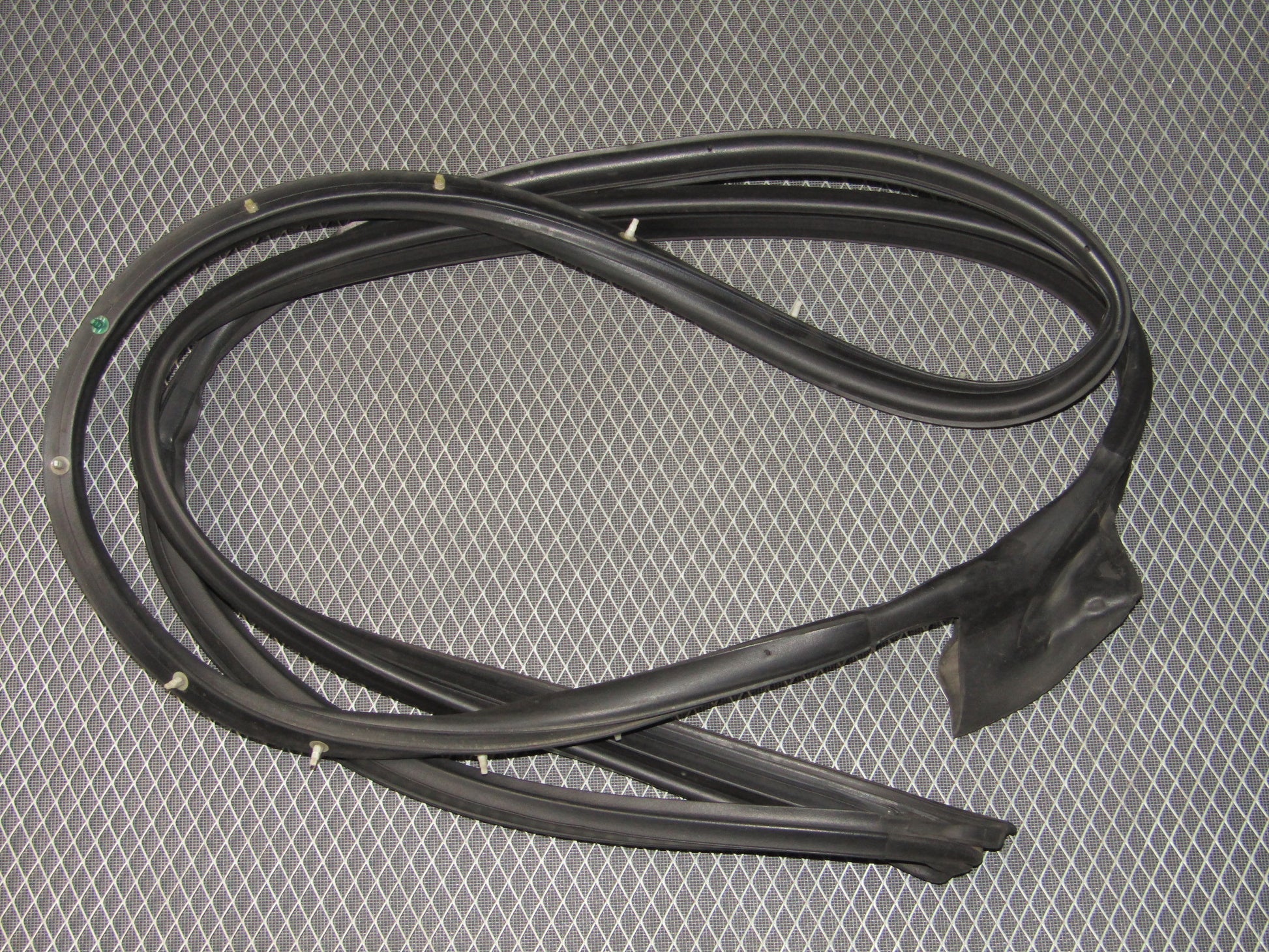 87-91 Toyota Crown Royal Saloon OEM Door Weather Stripping - Front Left