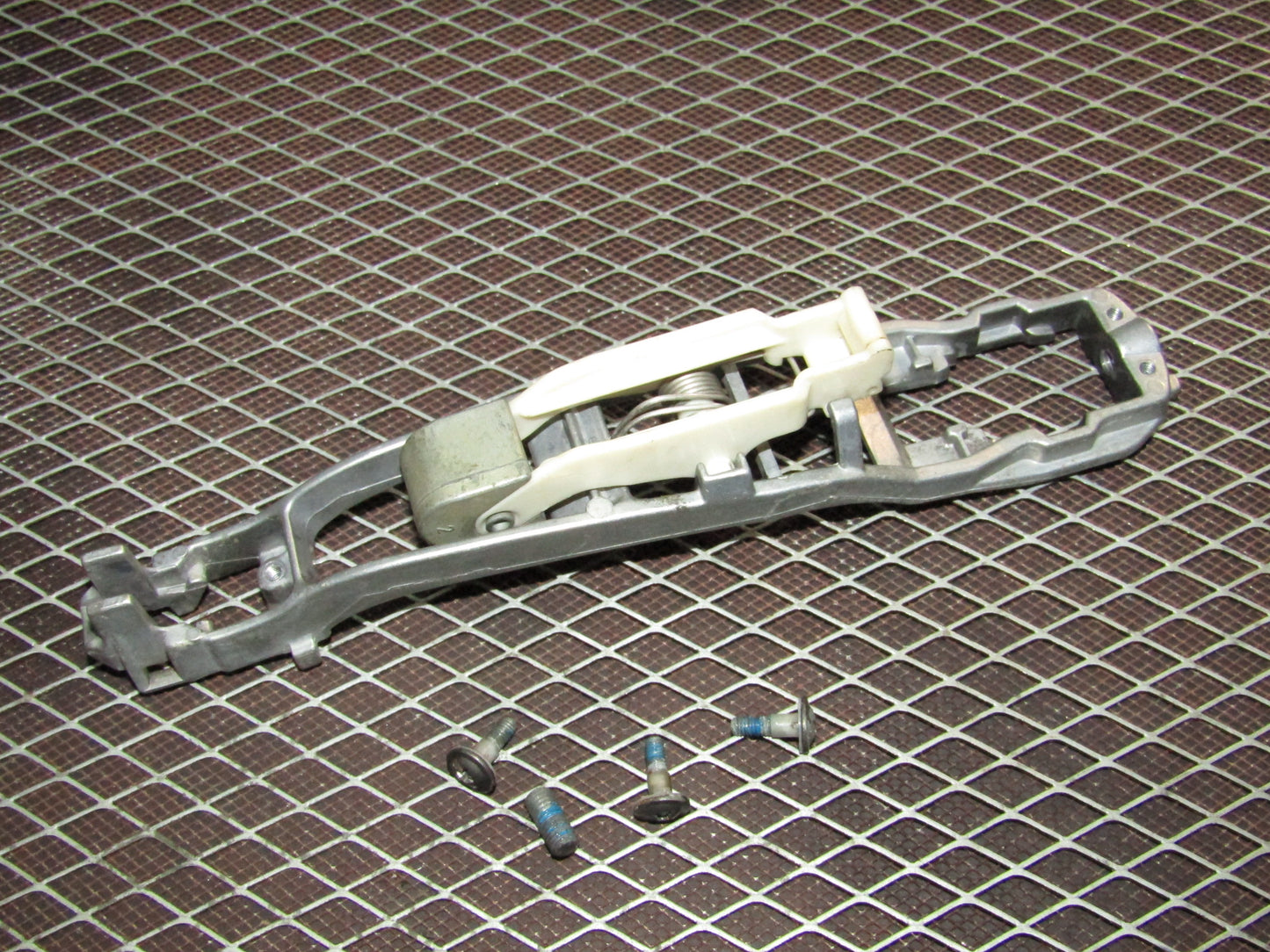 86-93 Mercedes Benz 300E OEM Rear Exterior Door Handle Mounting Bracket - Right