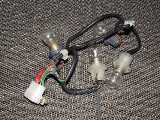 81-85 Mazda RX7 OEM Tail Light Bulb Socket - Left