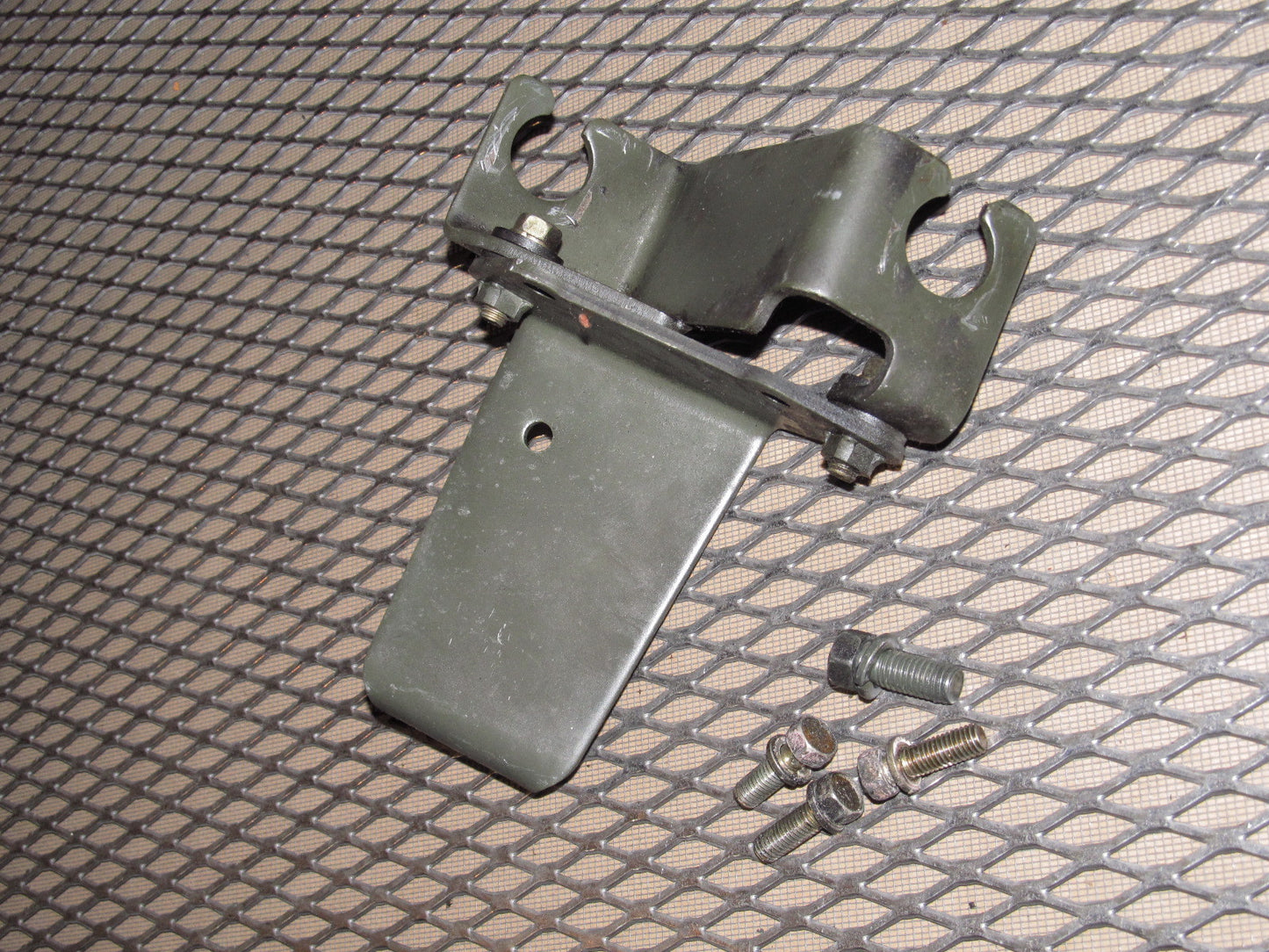 97 98 99 Mitsubishi Eclipse OEM Shifter Cable Holder Bracket - 2.0 NA M/T