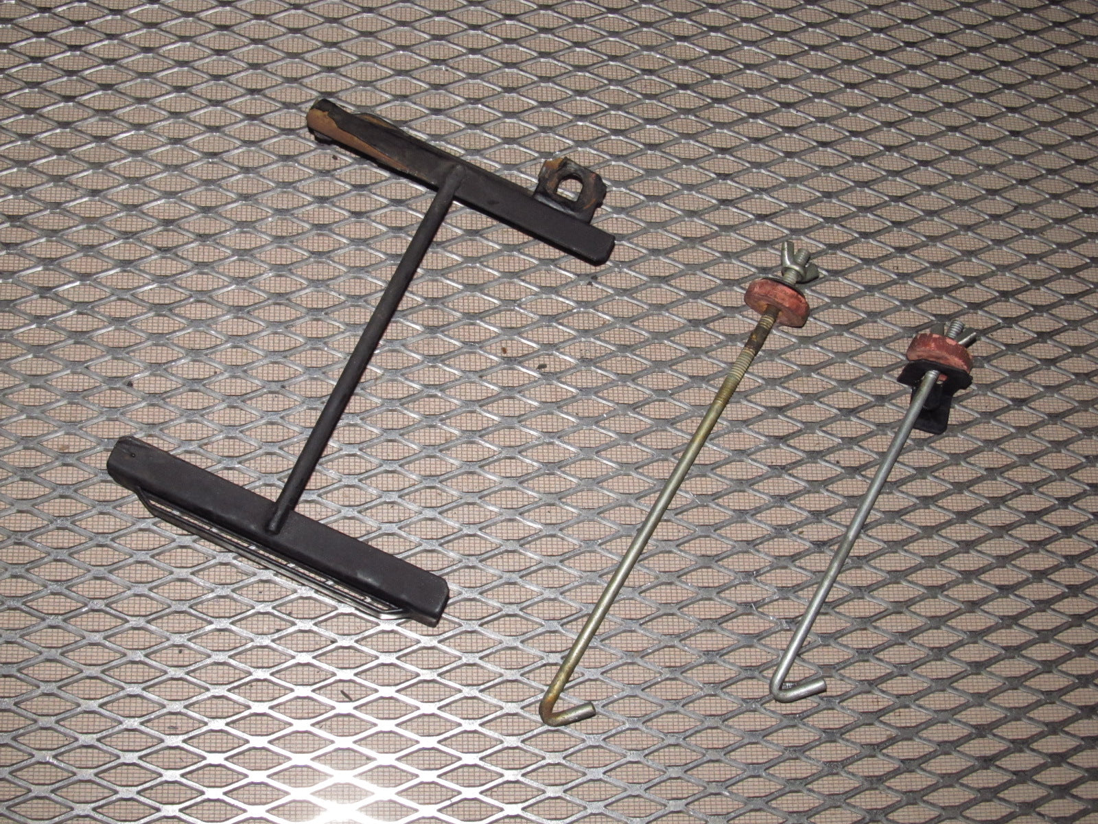81-85 Mazda RX7 OEM Battery Tie Down