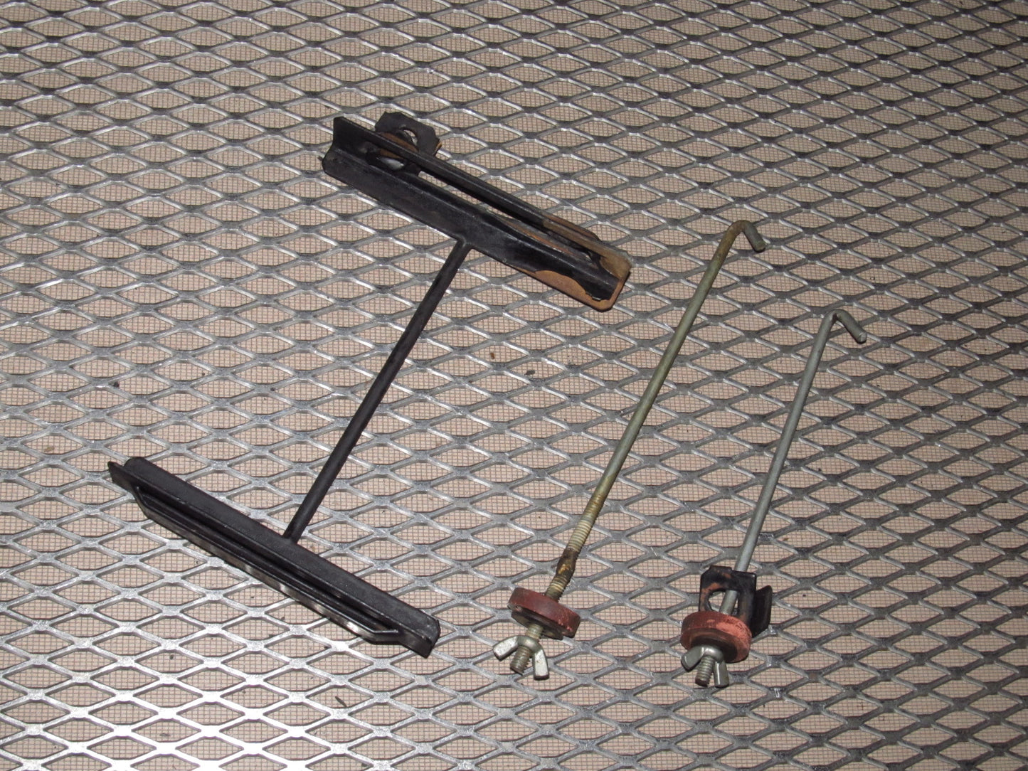 81-83 Mazda RX7 OEM Battery Tie Down