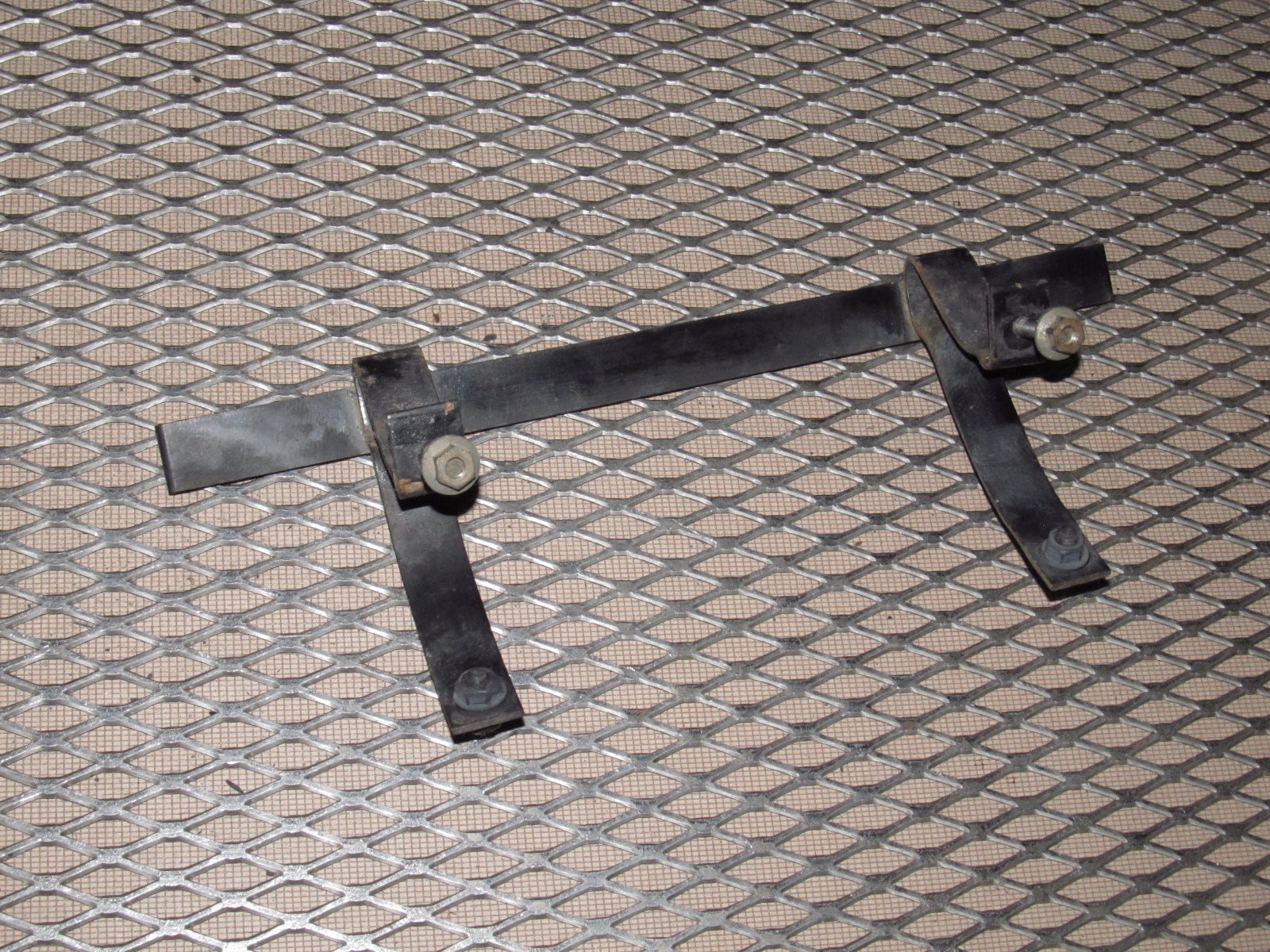 81-85 Mazda RX7 OEM Front License Plate Bracket