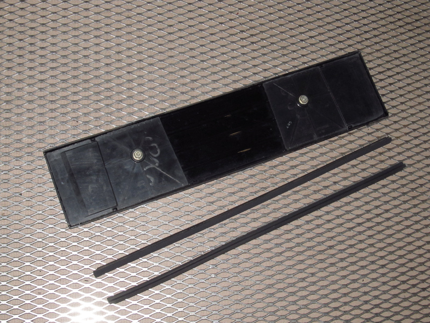 81-83 Mazda RX7 OEM Rear Tail Light Center Panel Cover