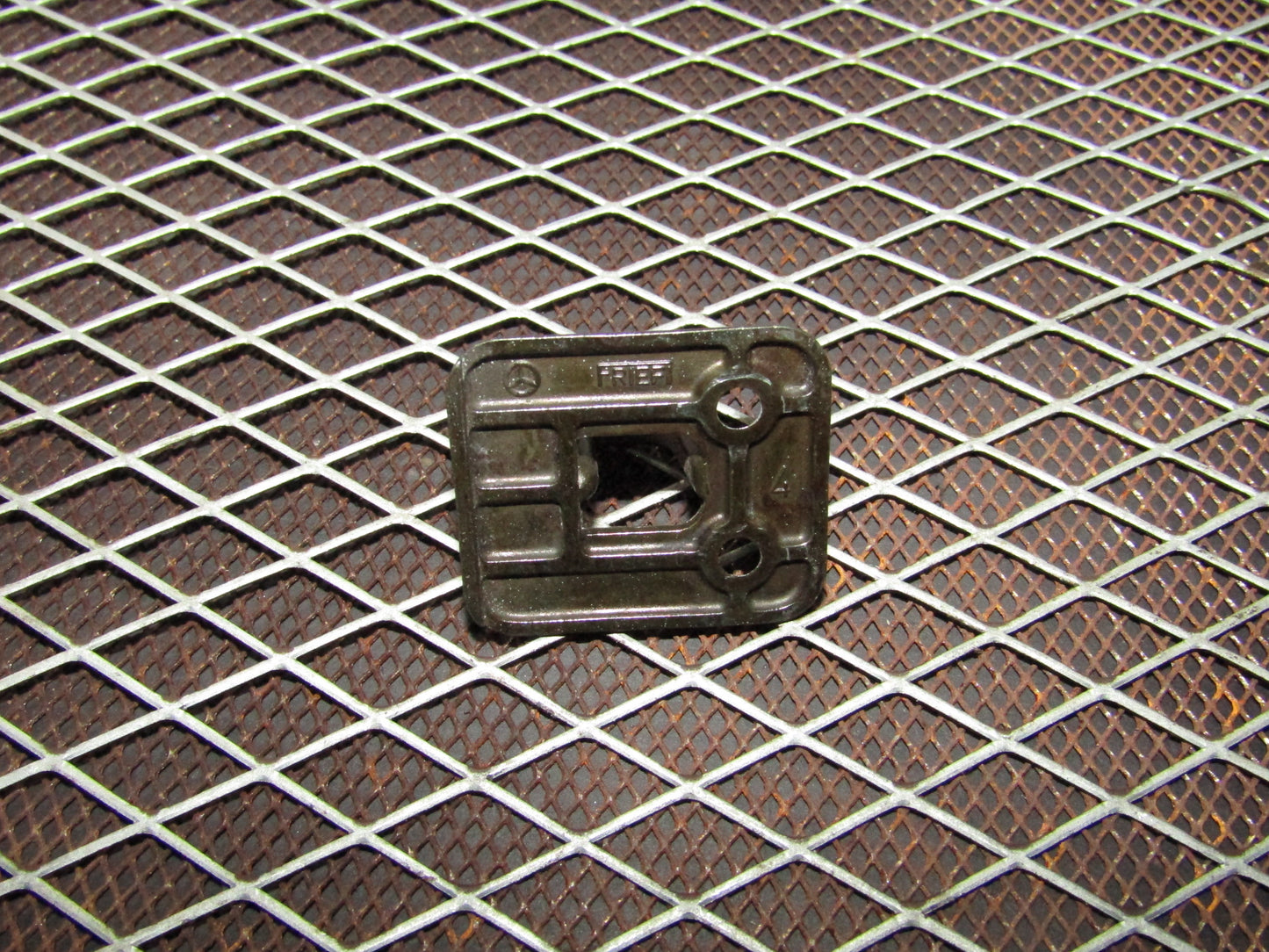 86-93 Mercedes Benz 300E OEM Glove Box Latch Striker