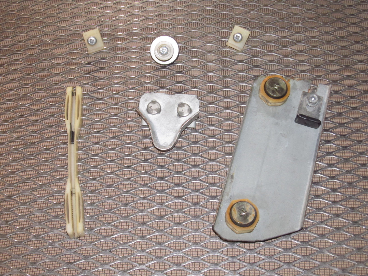 79 80 Datsun 280zx OEM Window Roller Stopper & Bracket - Right