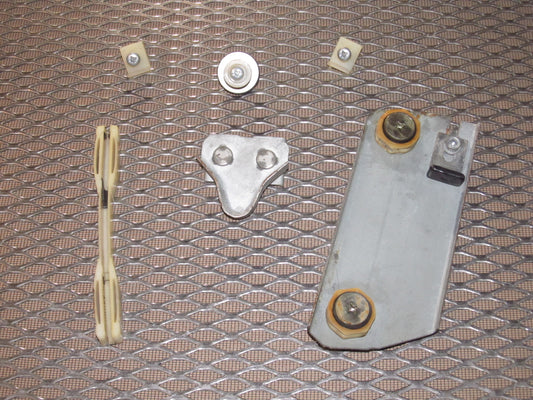 79 80 Datsun 280zx OEM Window Roller Stopper & Bracket - Right