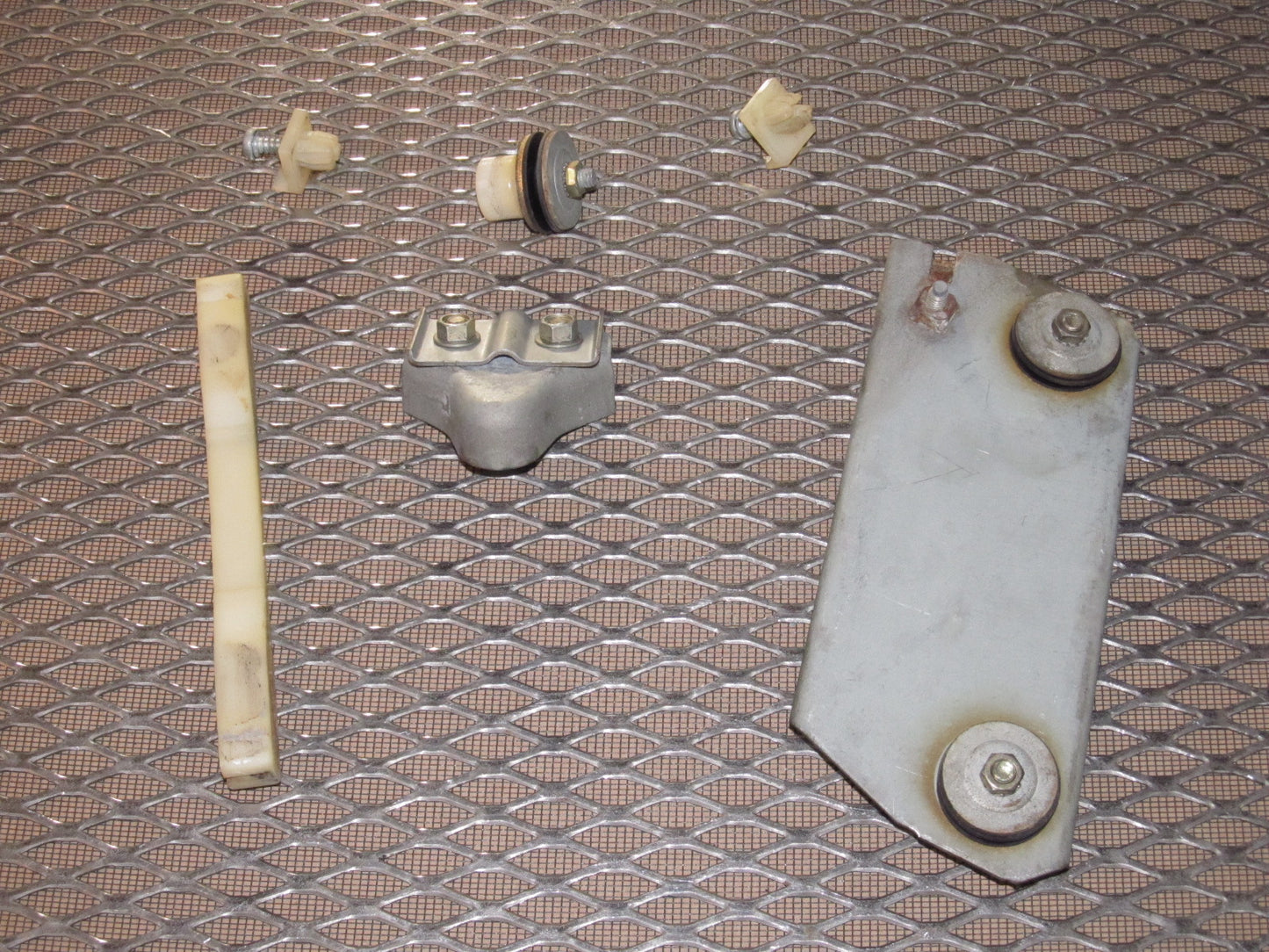 79 80 Datsun 280zx OEM Window Roller Stopper & Bracket - Right