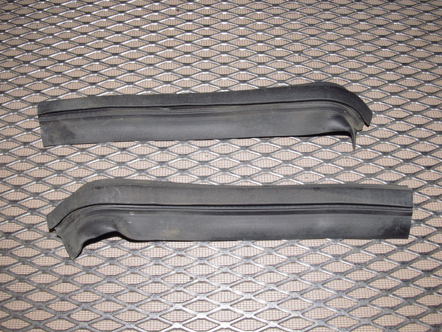 81-83 Mazda RX7 OEM Headlight Weather Stripping Cover