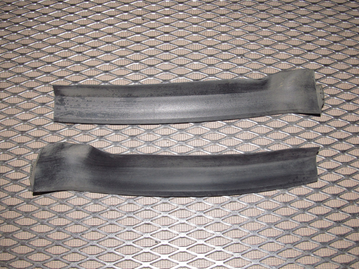 81-83 Mazda RX7 OEM Headlight Weather Stripping Cover