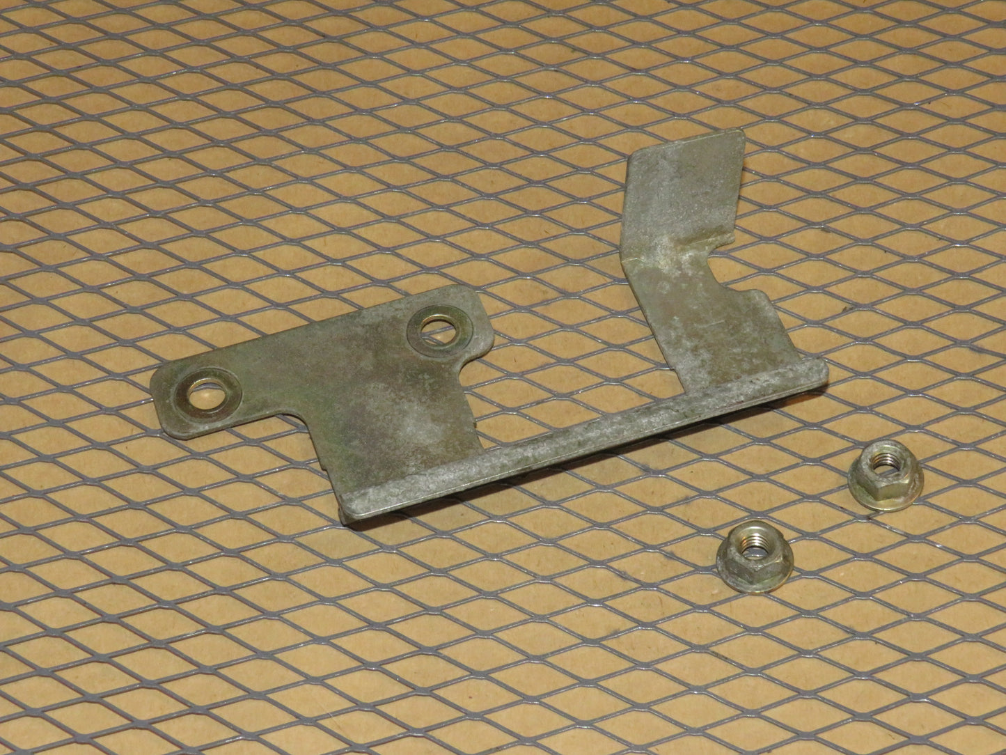 87 88 89 Nissan 300zx OEM Exterior Door Handle Mounting Bracket - Left